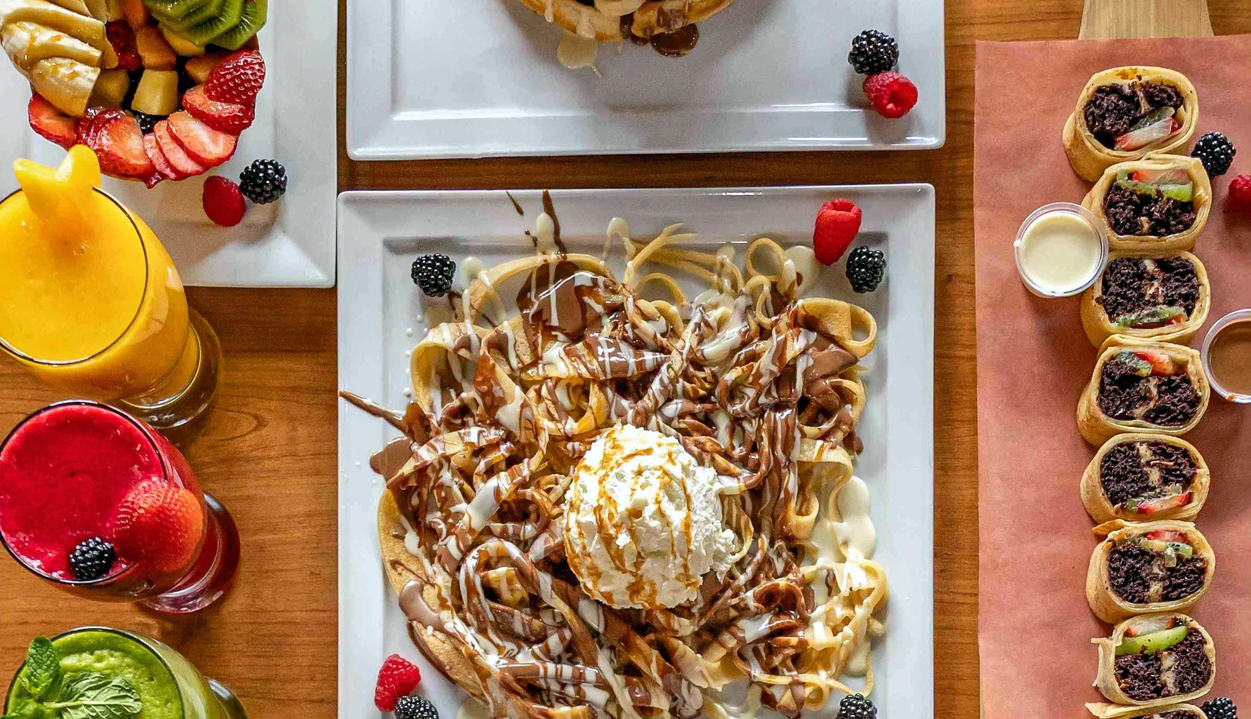 Spread of desserts and juices
